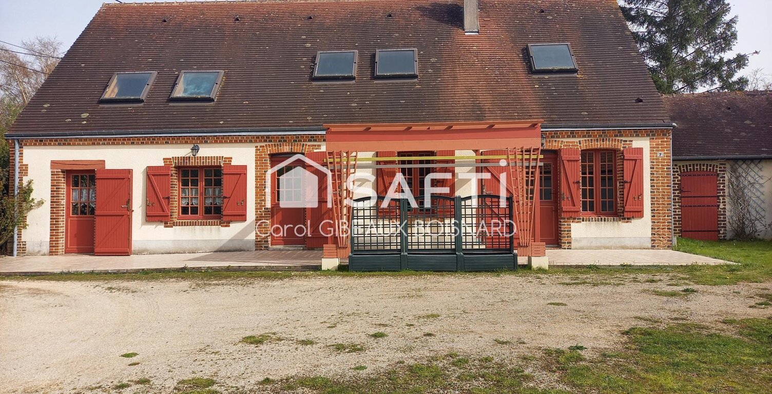 Maison de caractère avec double garage, combles aménageables et terrain. — photo 1