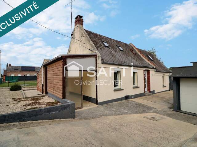 Maison en village avec toutes les commodités, 4 couchages possibles dont 1 au RDC, grand terrain constructible et divisible. Idéal pour un artisan. — photo du bien