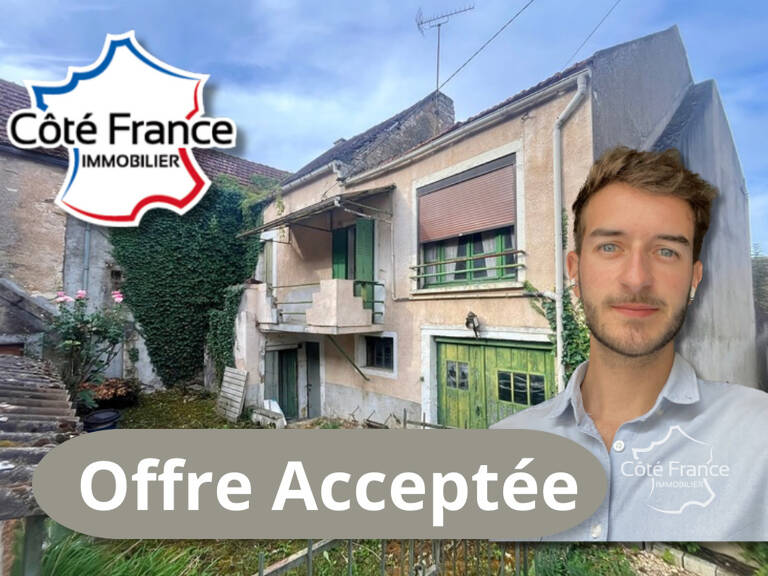 Maison à rénover avec grand garage et un jardin de 100m2 — photo 1