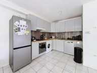 Appartement 4 pièces en rez-de-jardin — Copropriété récente — photo 4
