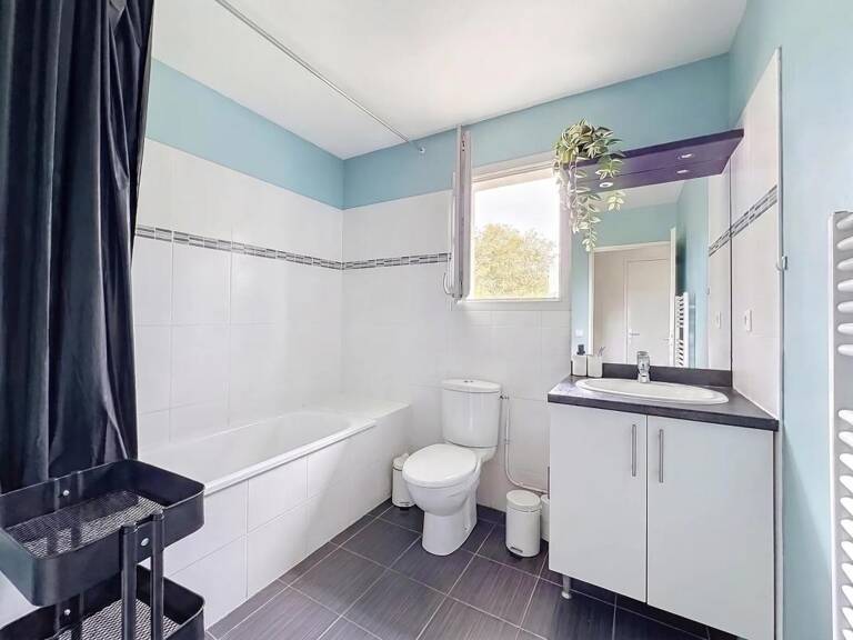 Appartement 4 pièces en rez-de-jardin — Copropriété récente — photo 1