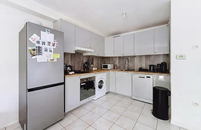 Appartement 4 pièces en rez-de-jardin — Copropriété récente — photo 3