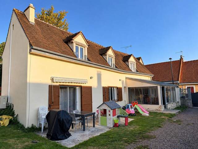 Maison 5 pièces de 110m² avec 3 chambres et jardin — photo du bien