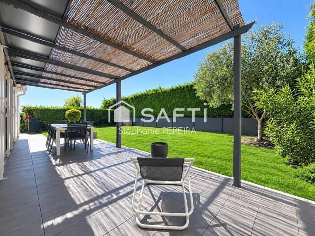 Maison climatisée avec jardin et garage — photo du bien