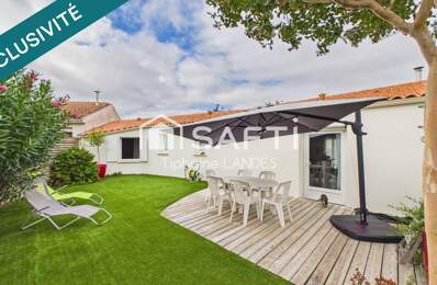 Jolie maison de plain-pied avec jardin au calme — photo du bien