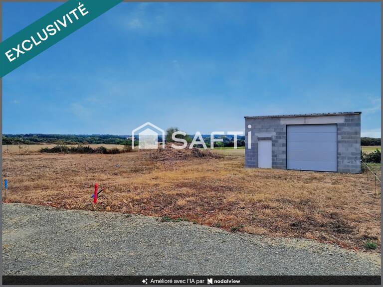 Beau terrain à bâtir avec grand garage déjà édifié — photo 1