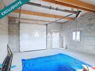 Beau terrain à bâtir avec grand garage déjà édifié — photo 2