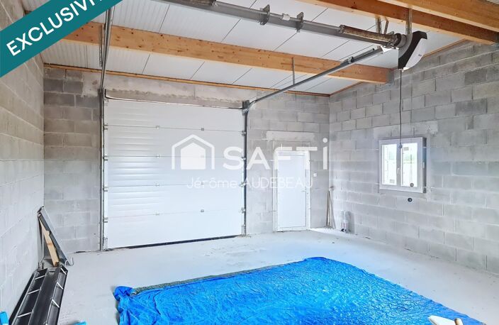 Beau terrain à bâtir avec grand garage déjà édifié — photo 2