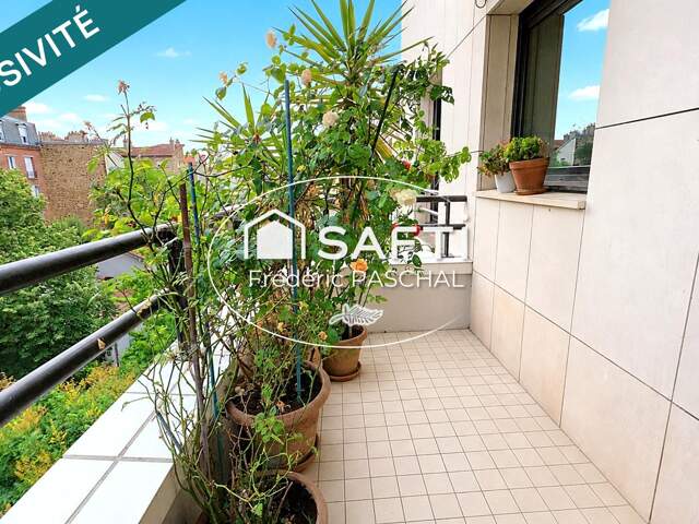 Appartement 55 m² - Balcon / Cave / Parking - République — photo du bien