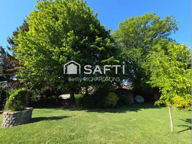 Semi plein pied. 5 chambres. Sous sol. Beau jardin — photo du bien