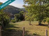 TERRAIN CONSTRUCTIBLE DE 2788 m²  CENTRE-VILLE DE SALINS-LES-BAINS  VUE DÉGAGÉE — photo 2