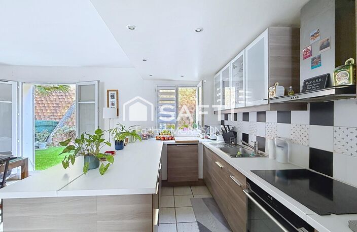 ANDRÉSY  MAISON FAMILIALE DE 130 M² AVEC 4 CHAMBRES, TERRASSE ET GARAGE — photo 2