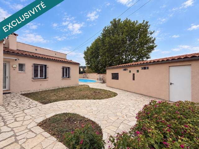 Prête à emménager ! Maison de plain-pied avec piscine, véranda et dépendance — photo du bien