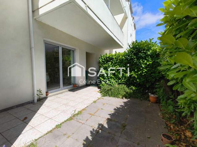 APPARTEMENT T4 - 3 CH - GARAGE - JARDIN/TERRASSE — photo du bien