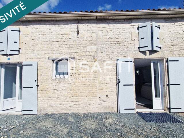 Maison rénovée avec le charme de la pierre — photo du bien