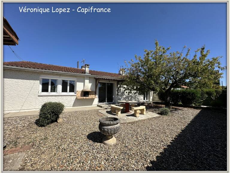 Le Passage, maison de plain-pied de 93m² avec garage, jardin et abri en dur — photo 1