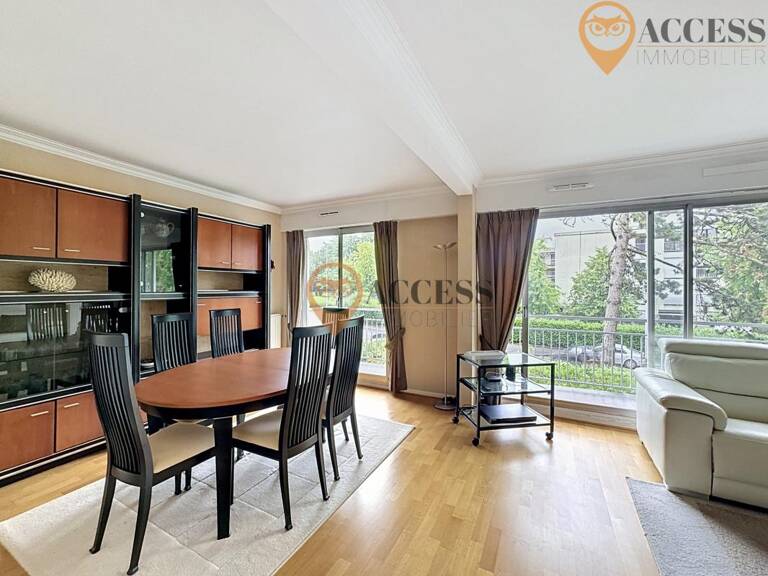 MARGENCY - Appartement avec cave, balcon et parking — photo 1