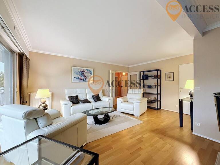 MARGENCY - Appartement avec cave, balcon et parking — photo 1