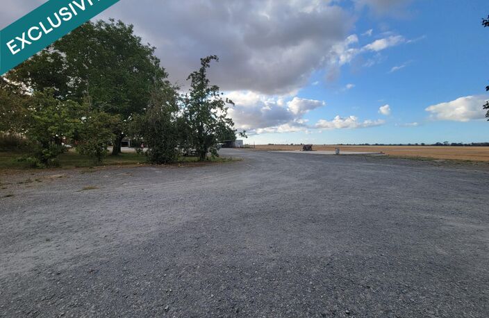 ? À Martragny, profitez d'un terrain de 1 465 m² au calme, avec une dalle béton déjà présente et un espace arboré, idéalement situé à seulement 10 minutes de Bayeux et 20 minutes de Caen. — photo 2