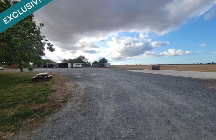 ? À Martragny, profitez d'un terrain de 1 465 m² au calme, avec une dalle béton déjà présente et un espace arboré, idéalement situé à seulement 10 minutes de Bayeux et 20 minutes de Caen. — photo 3