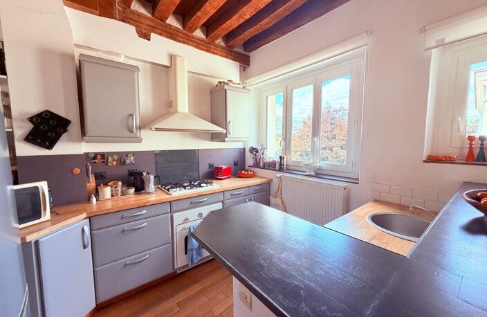 Chaleureux duplex en plein coeur de ville — photo 4