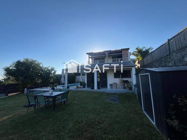 Villa R+1 avec jardin et piscine à St-François — photo du bien