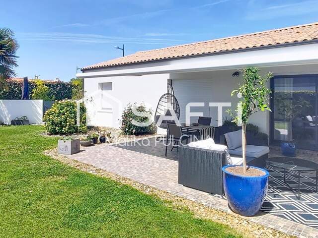 Plain-pied entièrement climatisé, piscine et beaux volumes — photo du bien