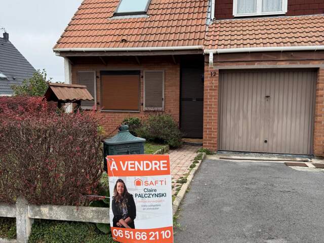 EXCLUSIVITÉ SAFTI  Maison de 98 m² avec jardin, garage et sous-sol complet — photo du bien
