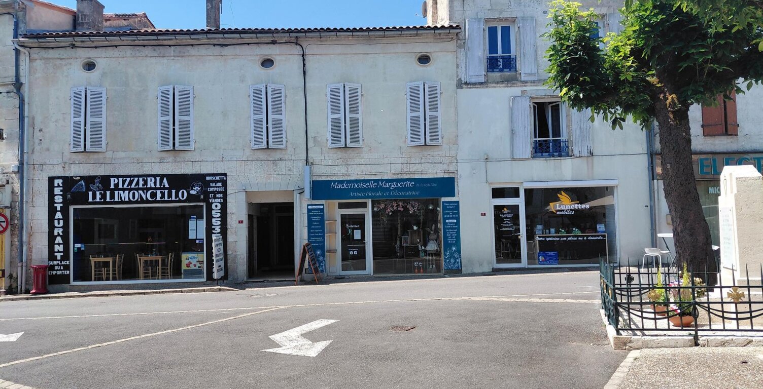 Immeuble de rapport 8 lots Place du marché Mareuil — photo 1