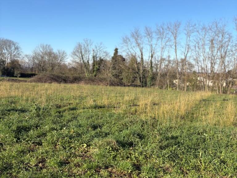 Terrain à bâtir à Guîtres (33230) — photo 1