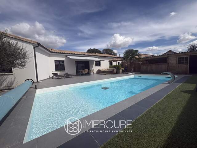 MAISON RECENTE DE PLAIN PIED AVEC PISCINE CHAUFFÉE — photo du bien