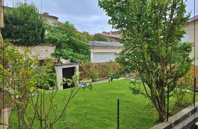Maison de ville en pierre de 120 m² habitables avec jardin et garage — photo du bien