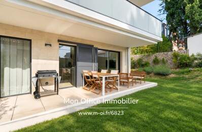 Référence : 6823-JDO. - Appartement lumineux avec jardin de 130 m² et place double en sous-sol — photo du bien