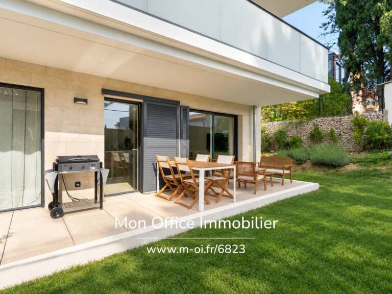 Référence : 6823-JDO. - Appartement lumineux avec jardin de 130 m² et place double en sous-sol — photo 1