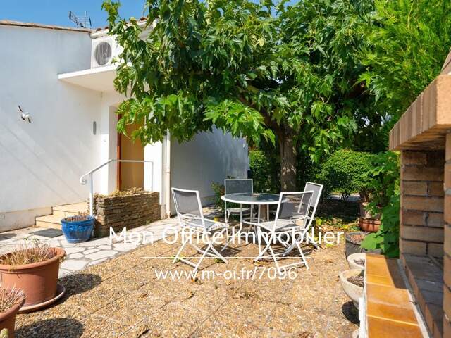 Référence : 7096-NAM - Maison 4 pièces jardin garage — photo du bien