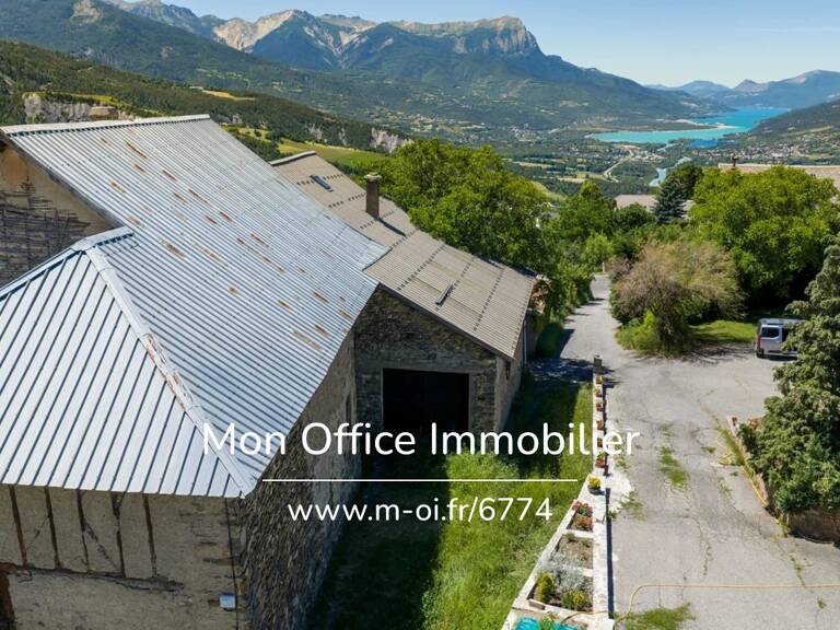 Référence : 6774-MTE - Bâtisse à rénover 150m² - orientée sud- vue Lac — photo 1