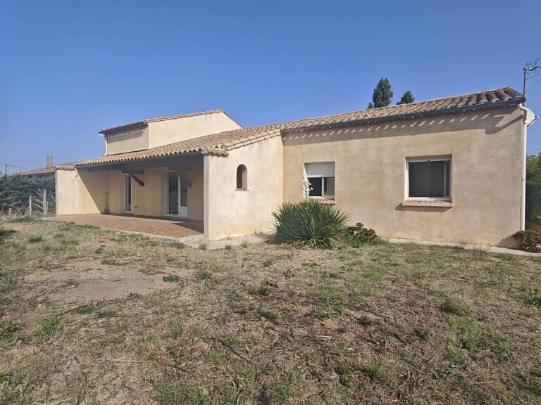 Maison de Plain-pied  avec garage et jardin — photo 1