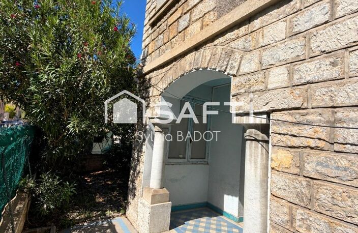 TOULON OUEST  MAISON DE CARACTERE DES ANNEES 30 COMPOSEE DE 3 APPARTEMENTS — photo 2
