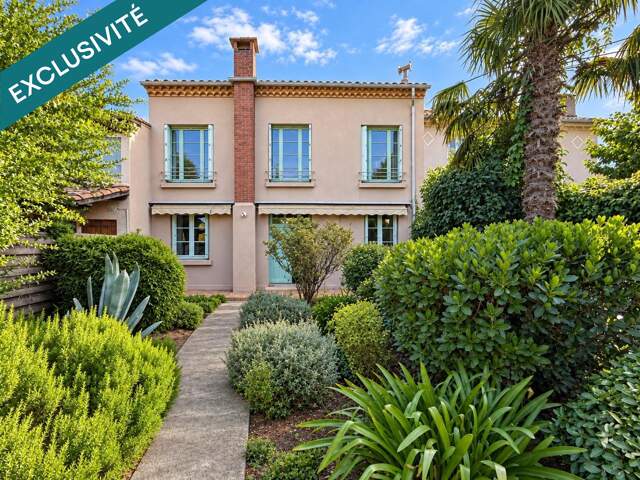 Le charme des années 60, le confort d'aujourd'hui et la douceur d'un jardin secret : la maison familiale par excellence — photo du bien