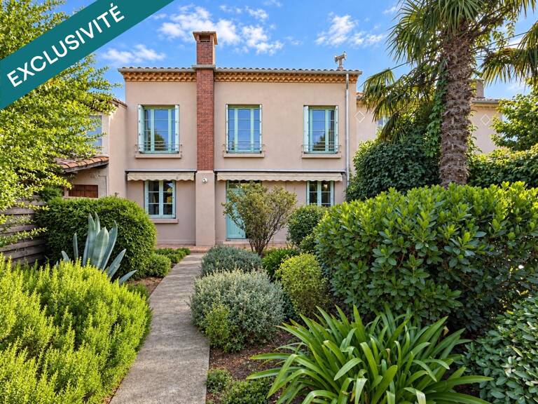 Le charme des années 60, le confort d'aujourd'hui et la douceur d'un jardin secret : la maison familiale par excellence — photo 1