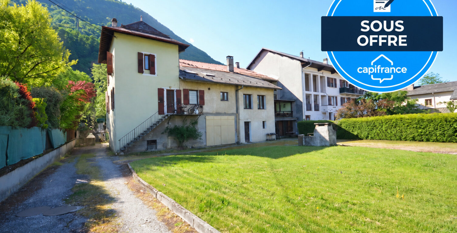 ENSEMBLE IMMOBILIER DE 8 APPARTEMENTS + MURS COMMERCIAUX – TERRAIN DE 2 070 m² — photo 1
