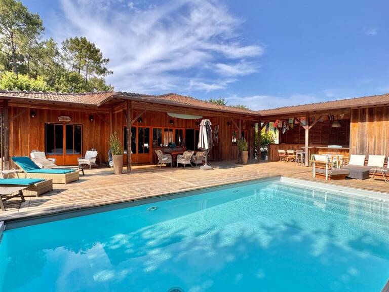 Villa bois de plain-pied avec piscine — photo 1