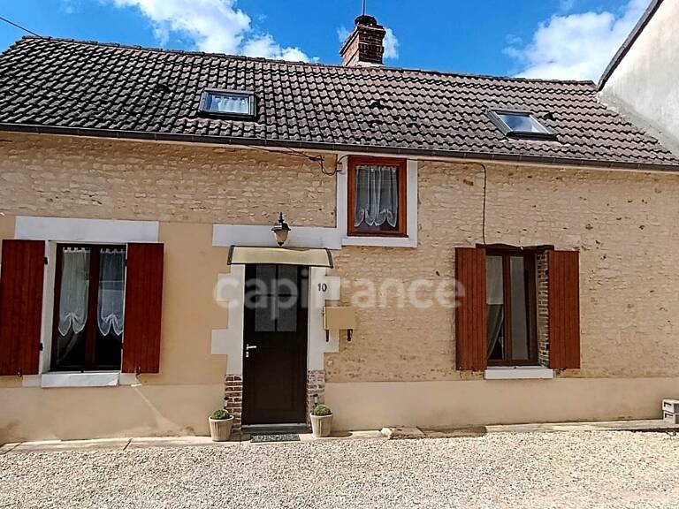 Virginie Masson – Capifrance vous propose cette maison en pierre de 92 m² pleine de charme, située à Seignelay, proche des commerces et des écoles — photo 1