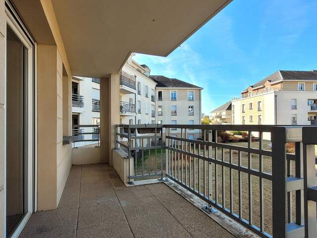 Appartement 3 pièces récent avec terrasse et parkings — photo du bien