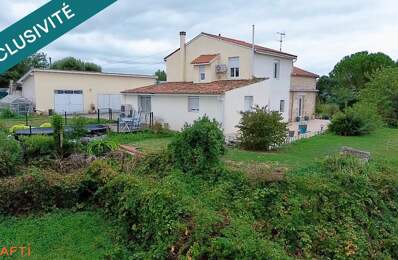 Maison familiale avec dépendances, vaste terrain et vue dégagée sur le Lot — photo du bien