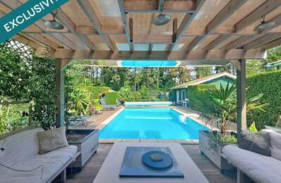 Maison avec piscine, sauna et terrain arboré — photo du bien