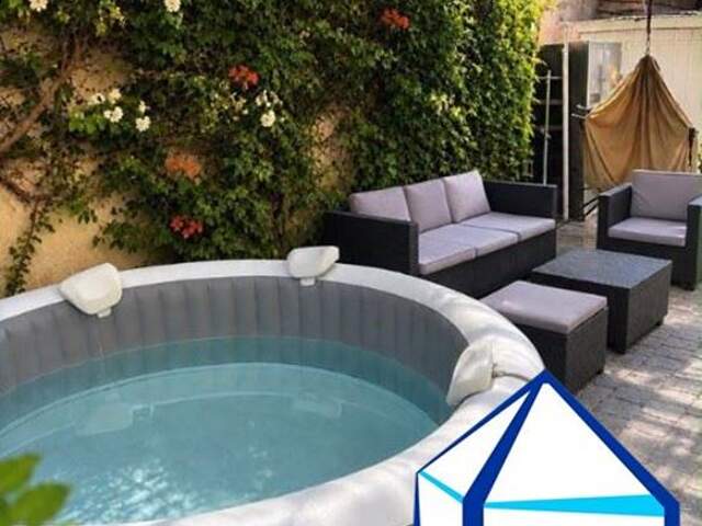 Maison - 92.74m ² — photo du bien