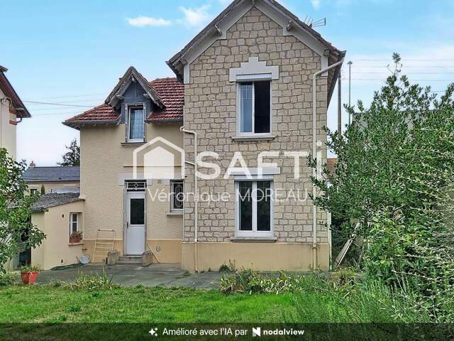 Maison de ville avec garage et jardin — photo du bien