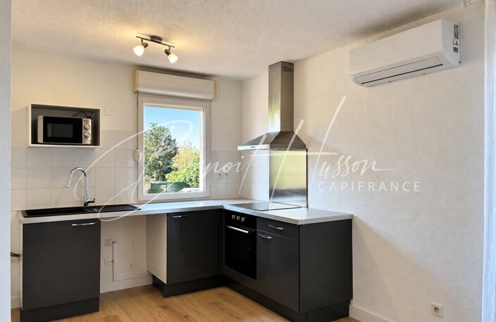 Appartement T2 de 43.60m² avec terrasse couverte et 1 place de parking — photo 2