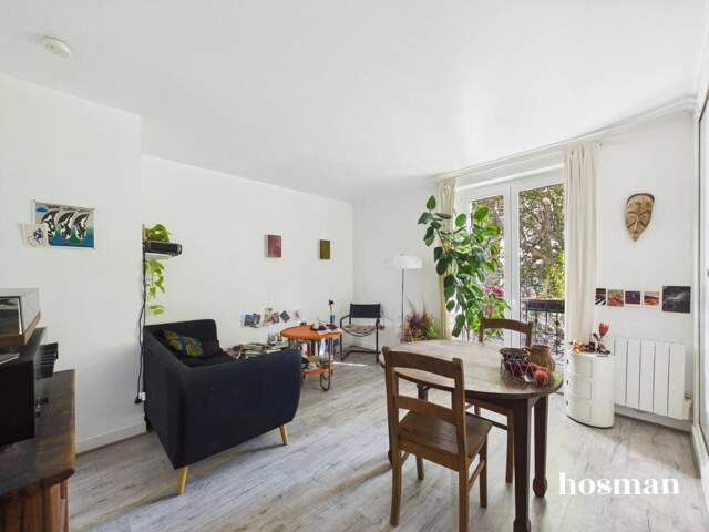 Appartement traversant - 3 pièces 50 m² - Rue Armand Carrel — photo du bien